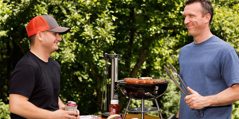 The Cuisinart Portable Charcoal Grill outside.