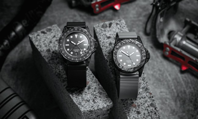 Hodinkee Unimatic collaboration watches on black and gray stone