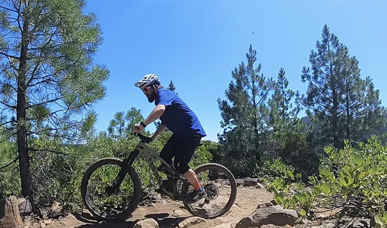 Mountain biking up a trail