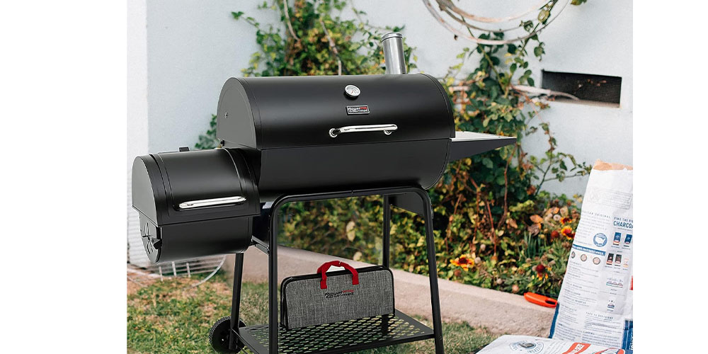 The Royal Gourmet 30-inch Barrel Charcoal Grill outside.