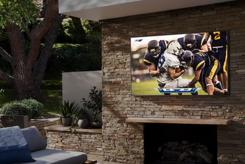 Samsung The Terrace outdoor-ready QLED smart TV lifestyle image on patio.