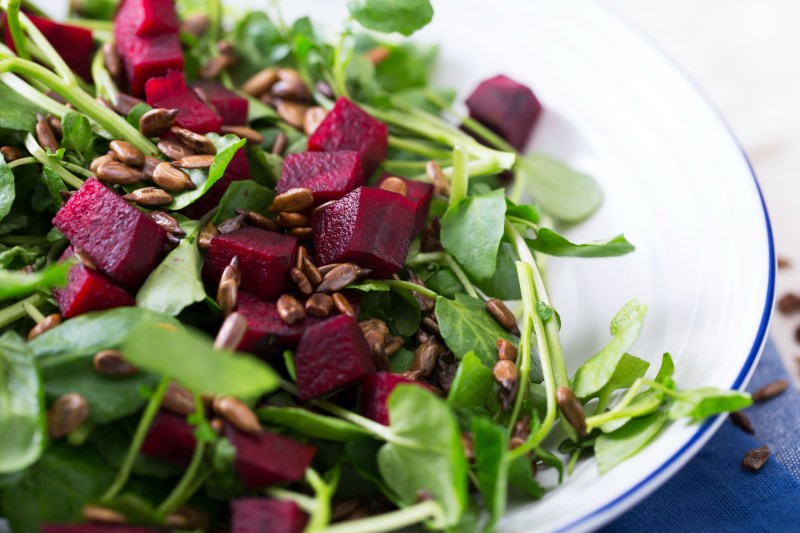 Watercress and beetroot salad with toasted sunflower seeds.