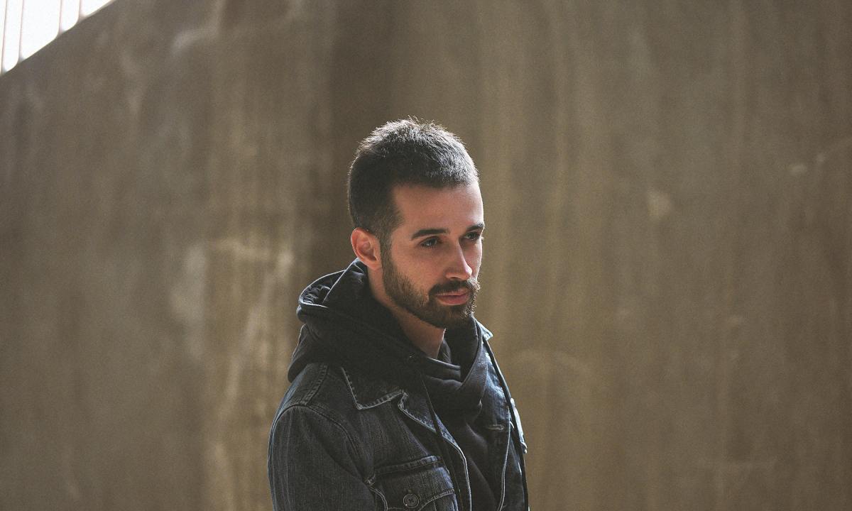 Man with a buzzcut and a beard