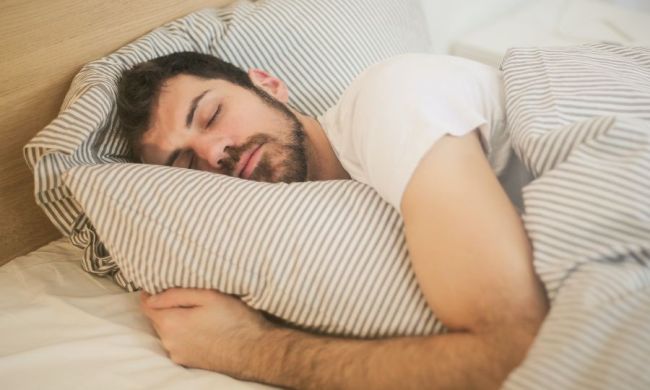 Man sleeping in t-shirt
