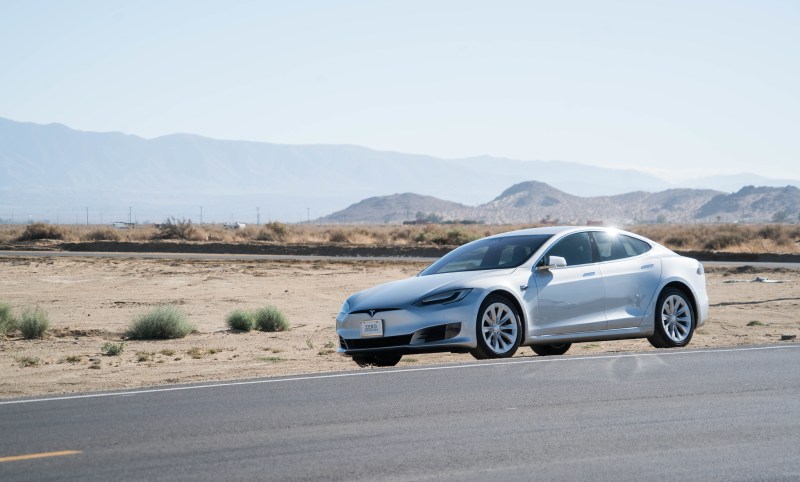 Tesla Model S in the desert front 3/4 view
