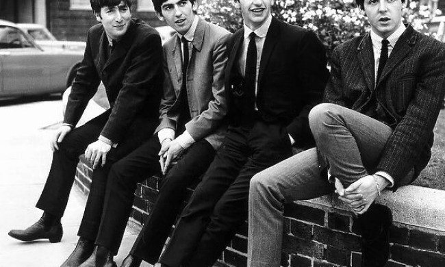 The Beatles sitting together