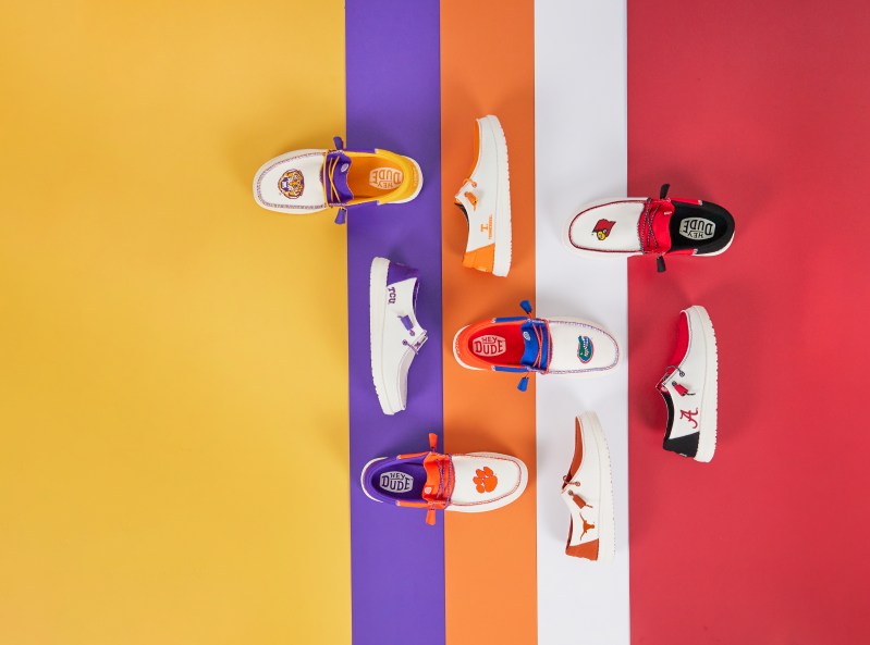 HEYDUDE Collegiate Collection lined up on colorful background