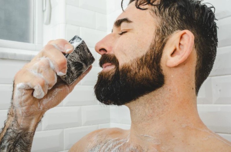 Man smelling soap