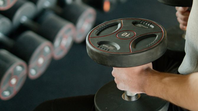 Man holding a dumbbell