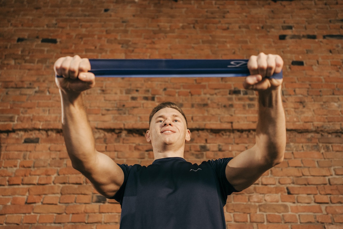 Man with blue resistance band