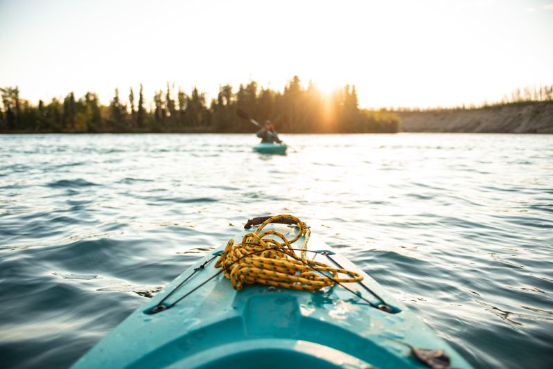 Kayaking on a lake.