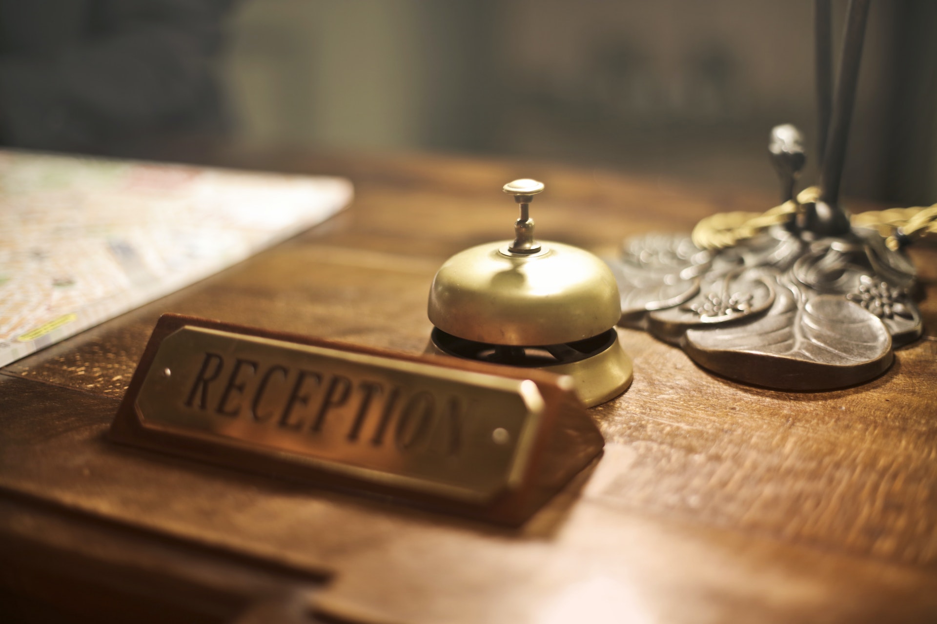 A closeup of a reception desk check in sign at a hotel