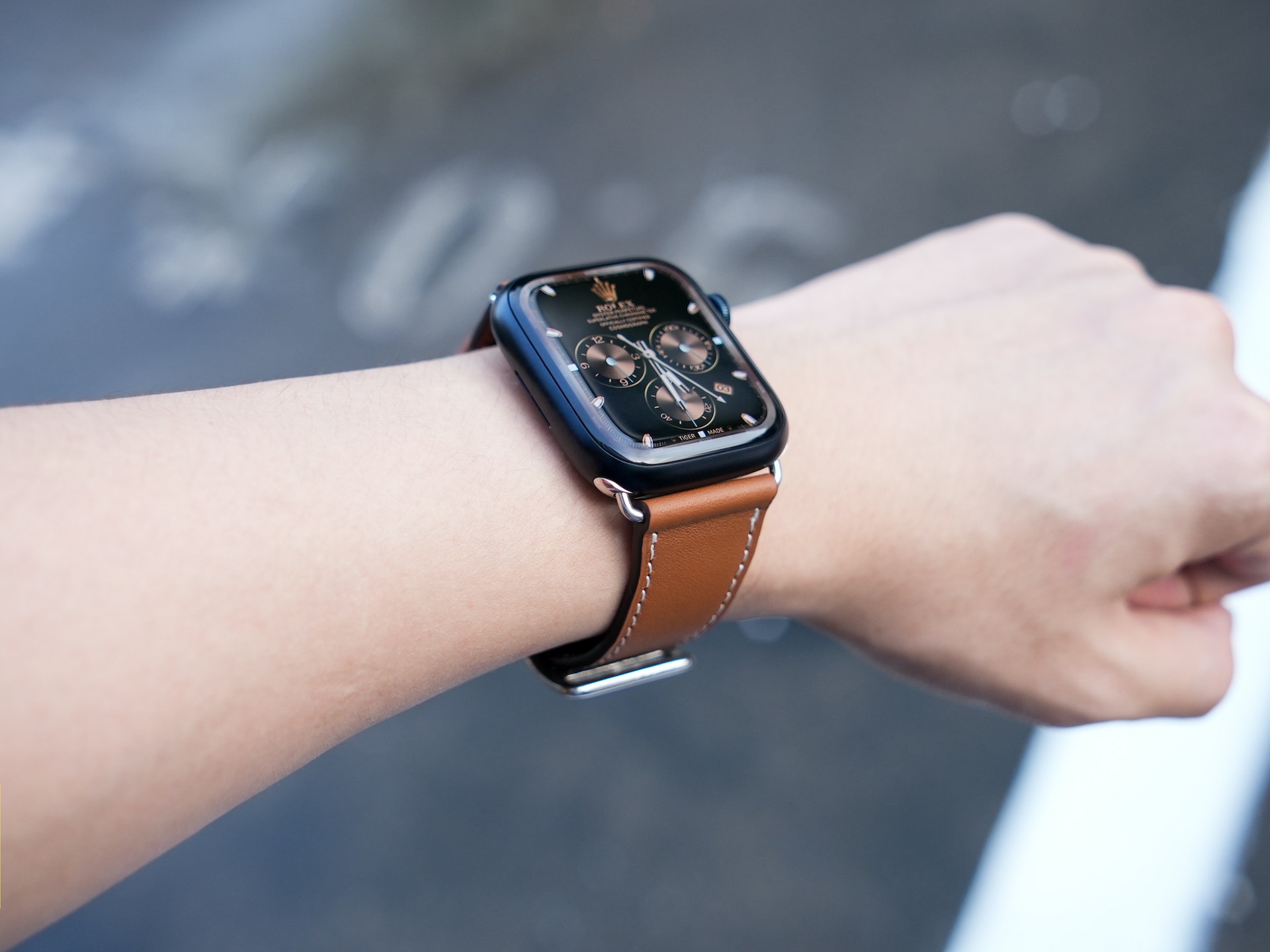 A Rolex watch on the wrist of a person.