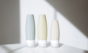 three bottles of skincare products