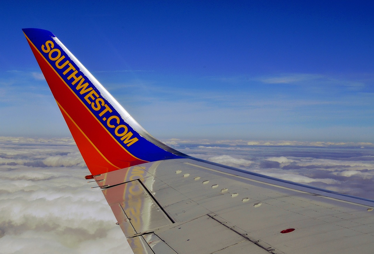 The wing of a Southwest Airlines plane in flight