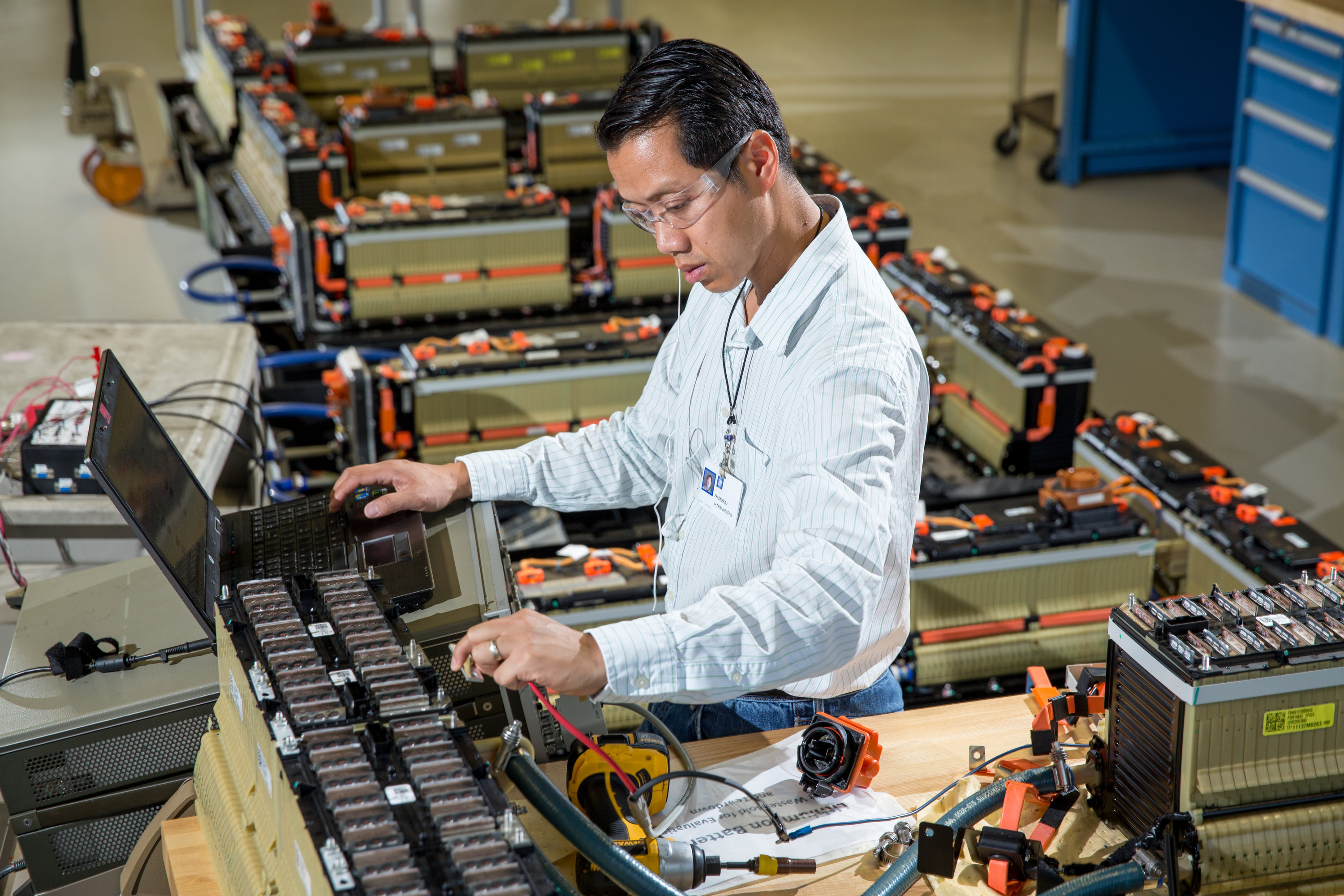 GM worker testing batteries in Warren Michigan plant