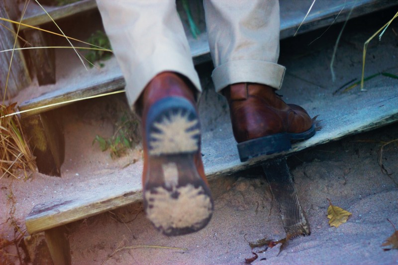 Man on steps in boots