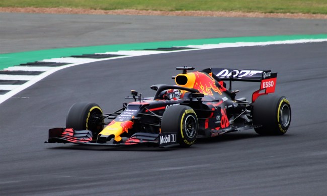 Max Verstappen driving a Red Bull F1 race car.