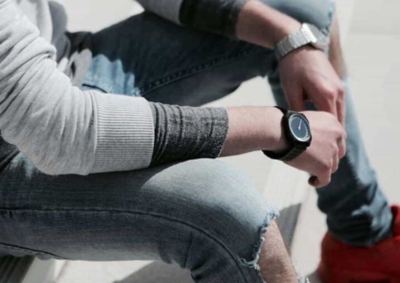 Slow watch on man's wrist