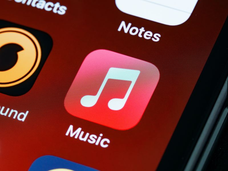 The Apple Music icon on and iPhone.