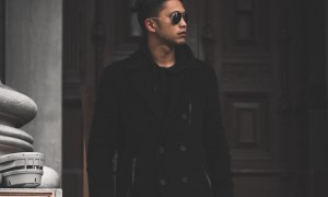 Man in black overcoat