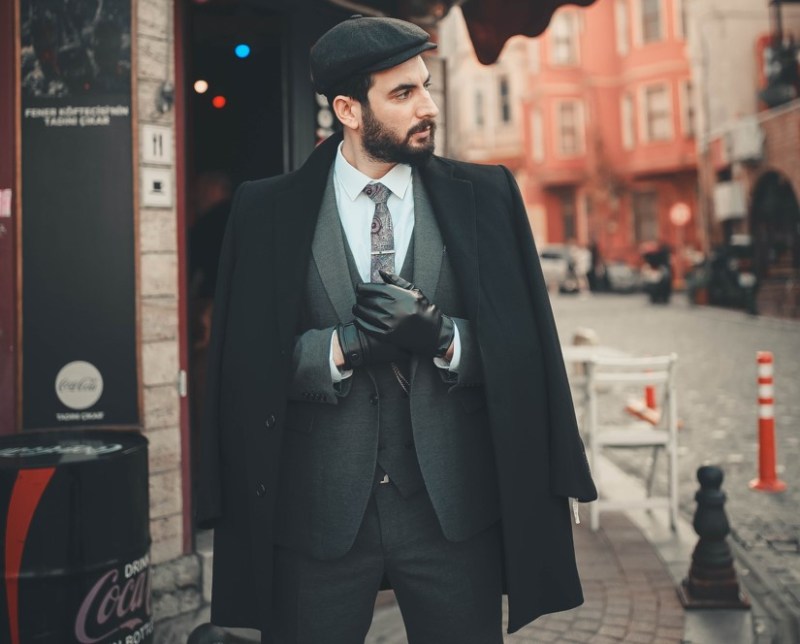 Man in overcoat and hat