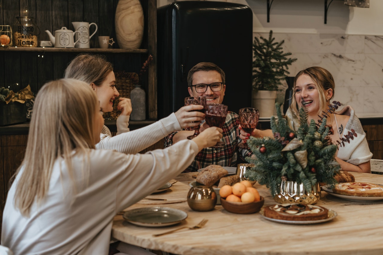 Friends eating around table