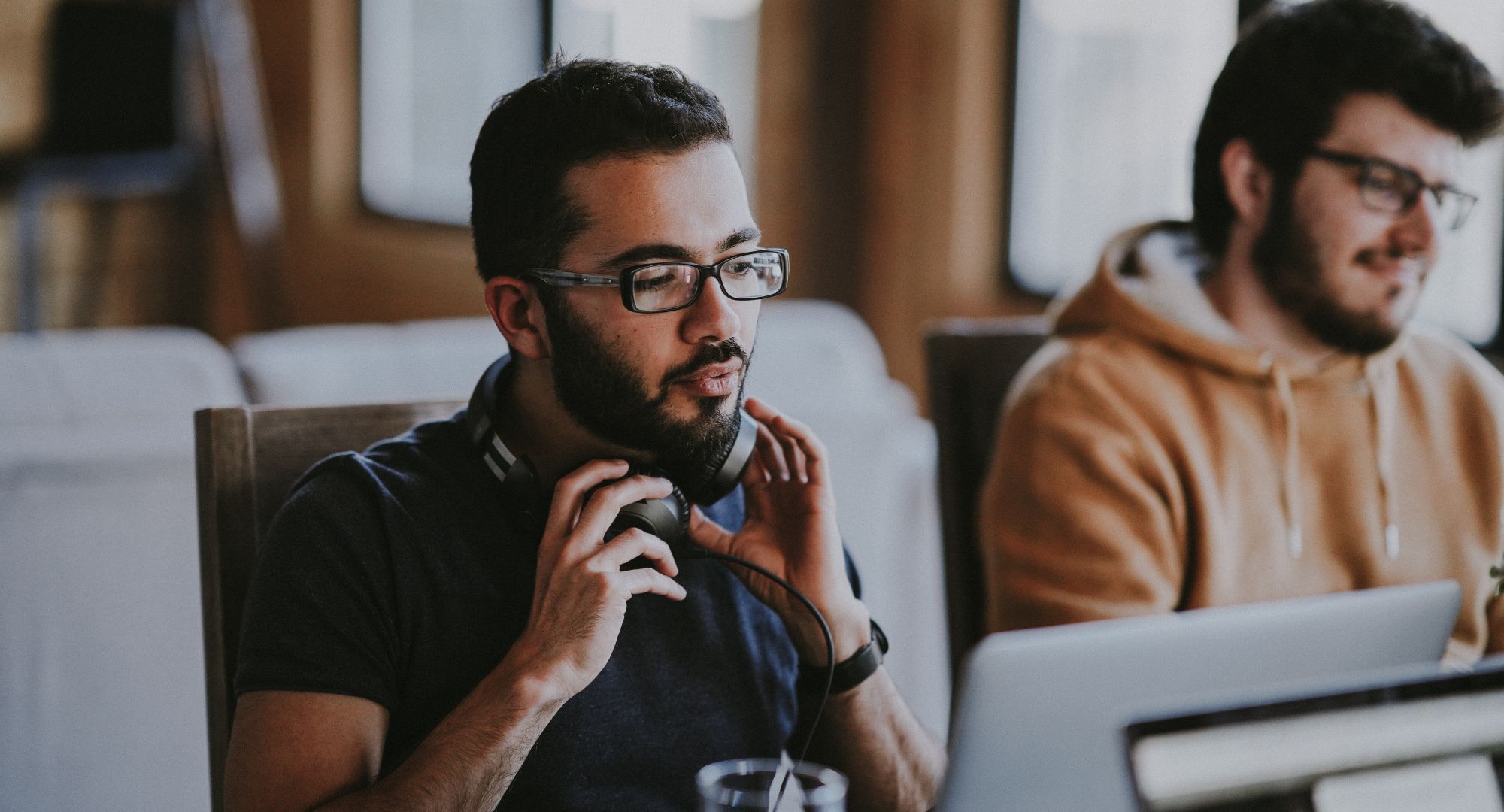 Man holding headphones