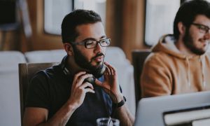 Man holding headphones