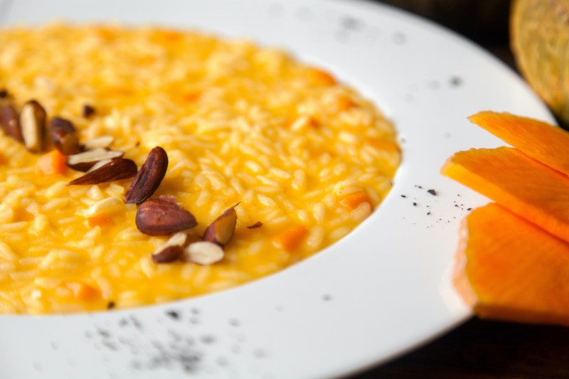 Pumpkin risotto on the plate - a traditional Italian recipe