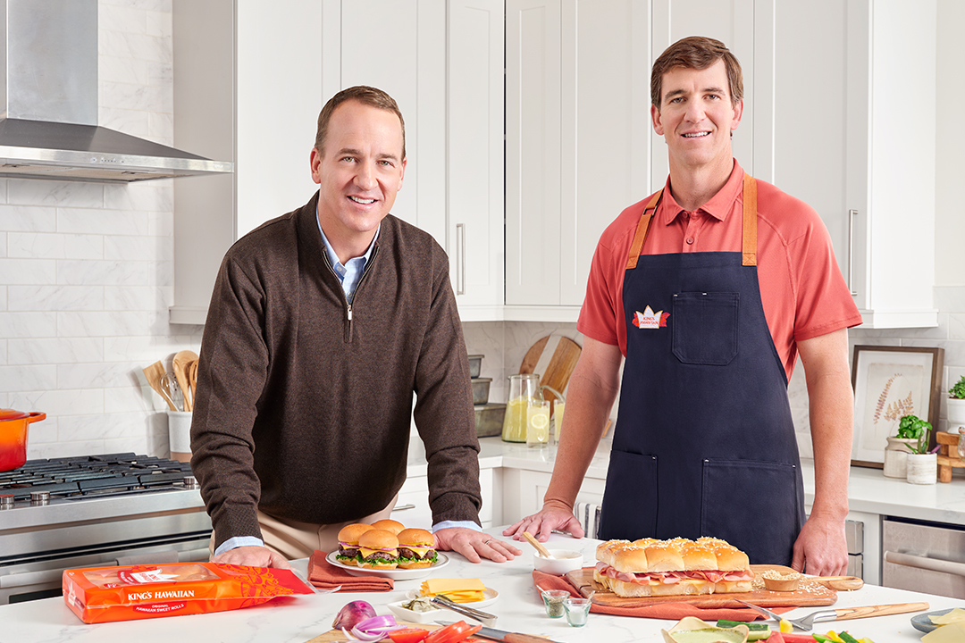 Eli and Peyton Manning celebrate Slider Sunday in a new King’s Hawaiian commercial