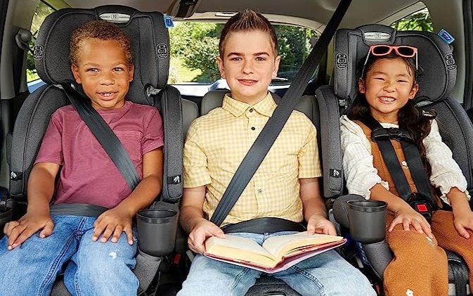 Graco car seat Black Friday sale with kids safely nestled inside car.