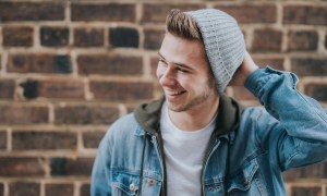Man in denim jacket and beanie