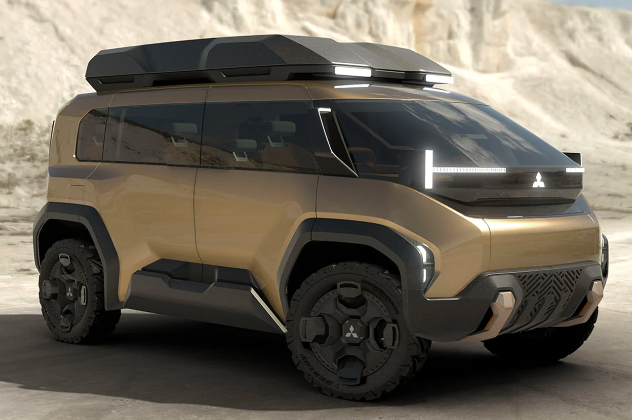 Mitsubishi DX Concept lifestyle van graphical render parked on sand in front of sand-colored cliffs.