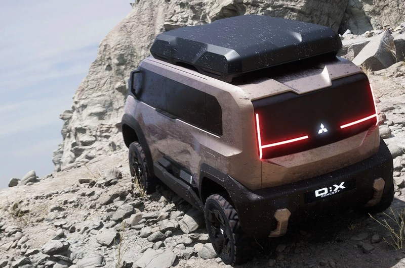 El render gráfico de la furgoneta de estilo de vida Mitsubishi DX Concept se detuvo mirando hacia abajo en una superficie.