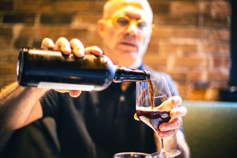 Pouring a stout beer