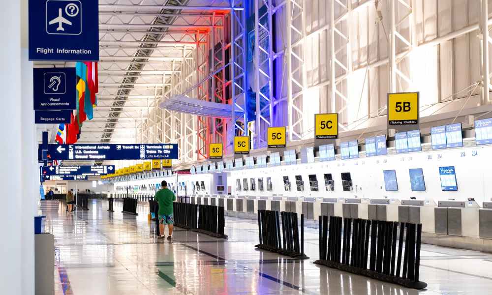 Man walking through airport terminal