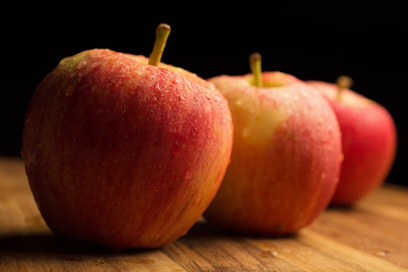 Apples against a black background