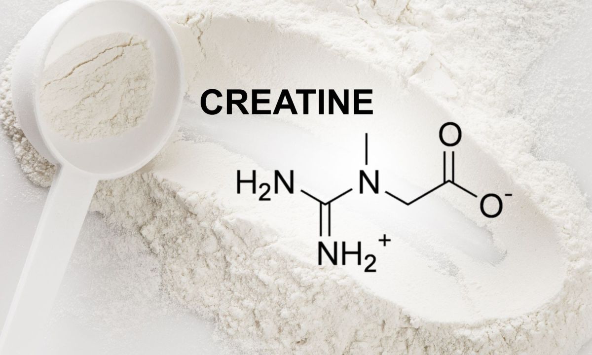 Scoop of Creatine Monohydrate Supplement and Chemical Formula