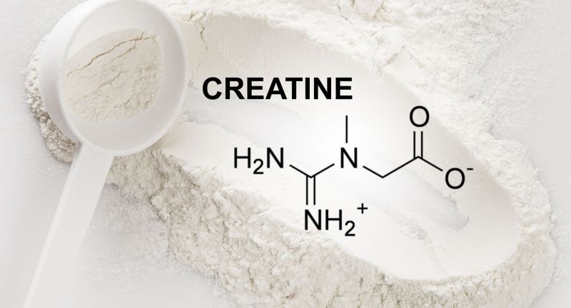 Scoop of Creatine Monohydrate Supplement and Chemical Formula