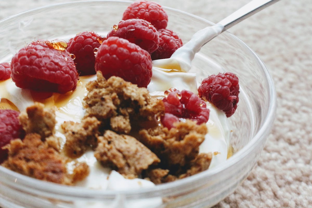 Greek yogurt with granola and raspberry
