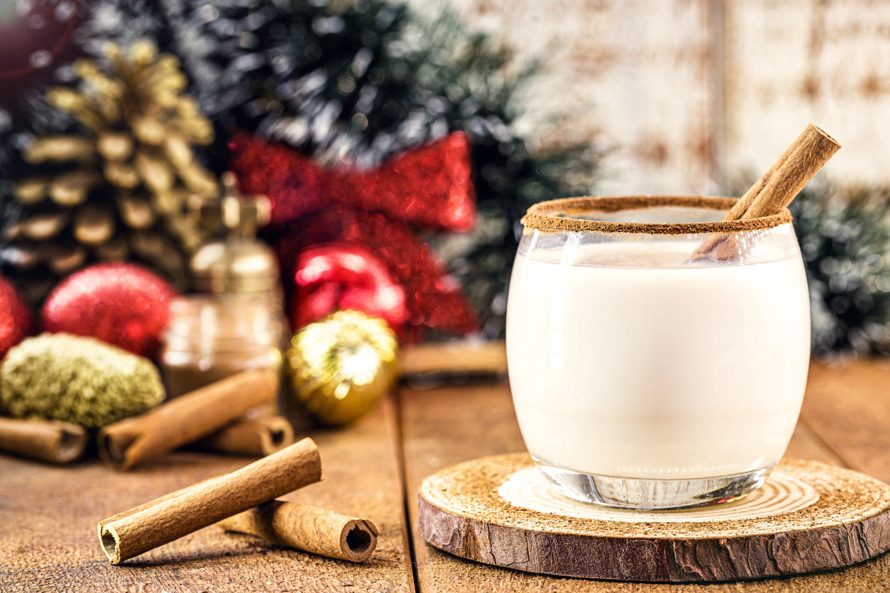 coquito on a wood coaster