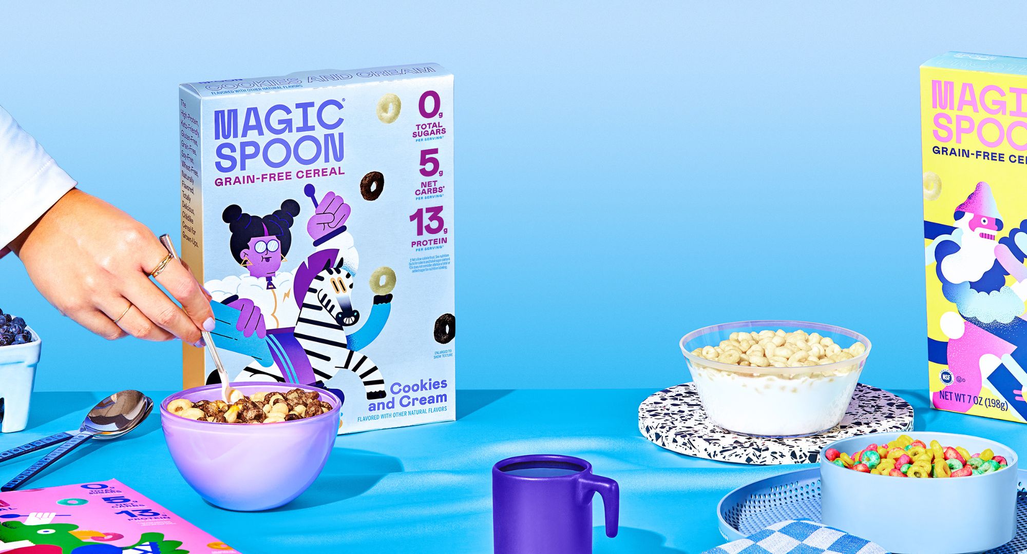 Magic Spoon cereal against a blue background