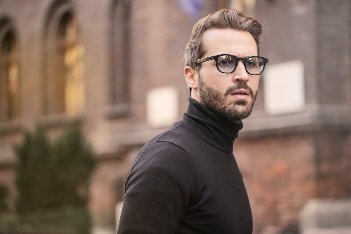 Man in turtleneck outside