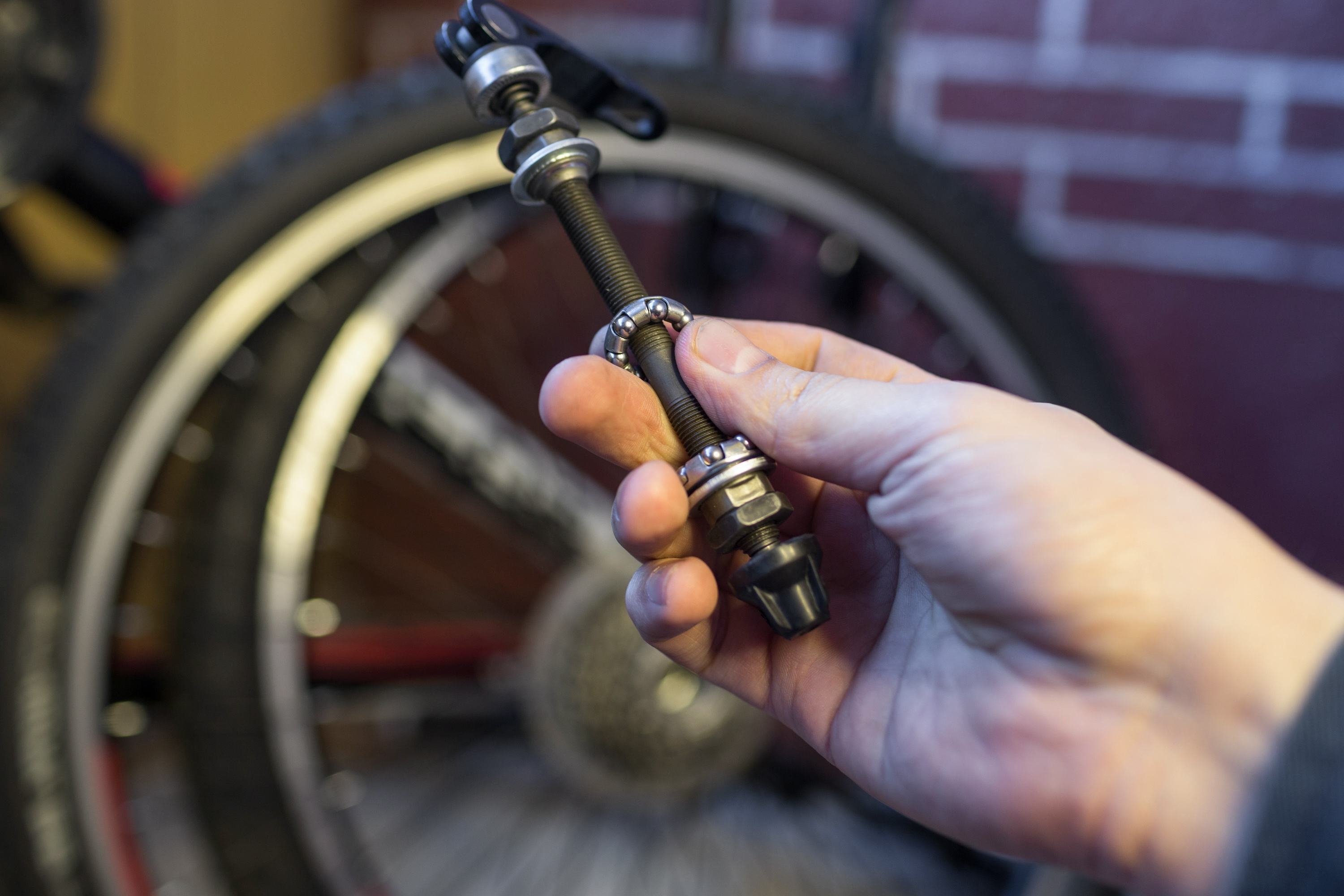 Changing the lubrication and cleaning the bearings of the bike hubs. New shiny bearings installed in the hub. bicycle repair.