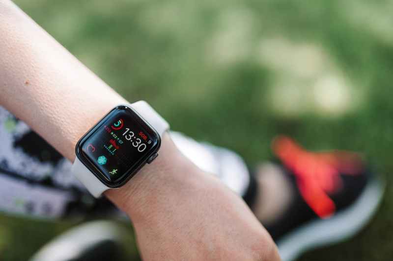 A person wearing an Apple Watch while working out.