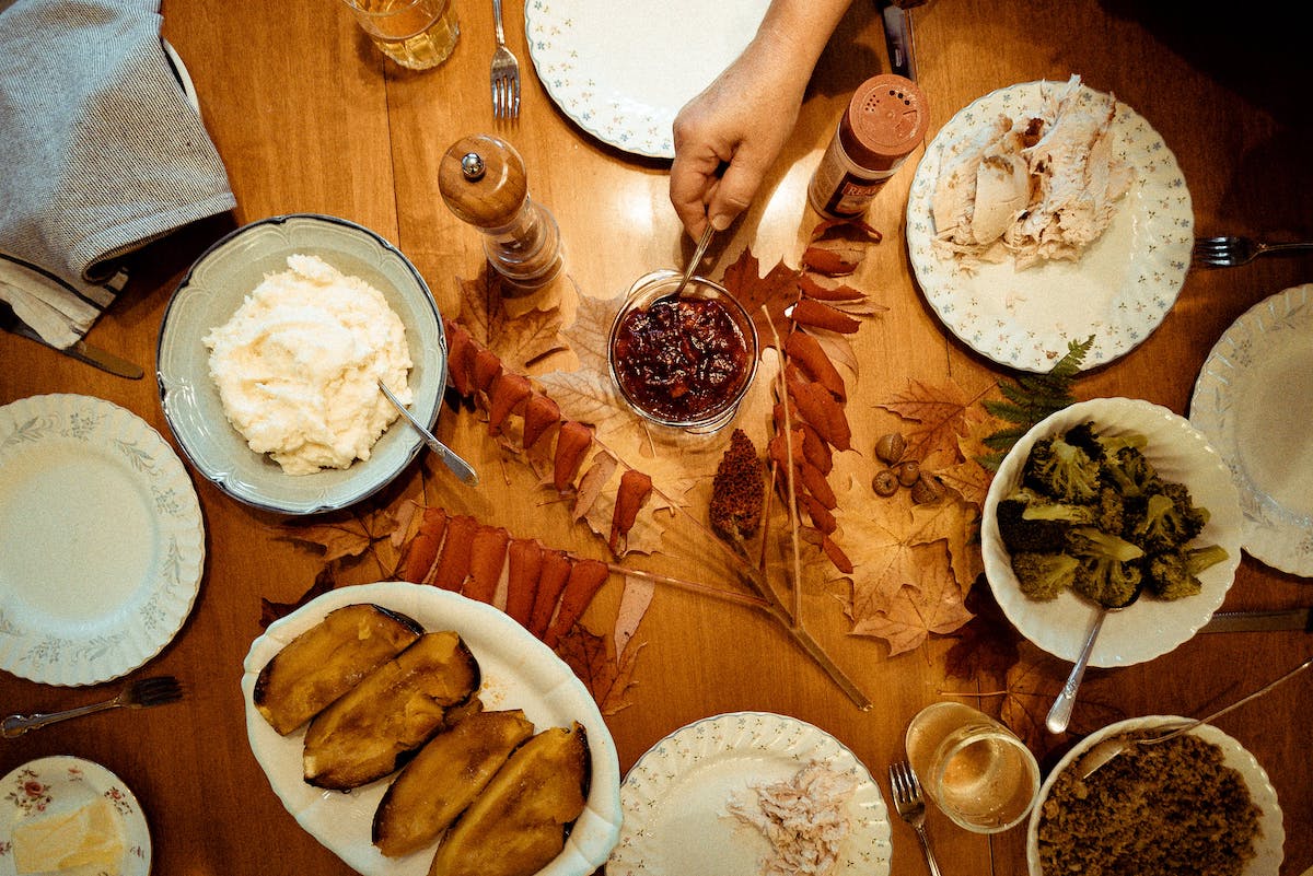 a table full of thanksgiving foods