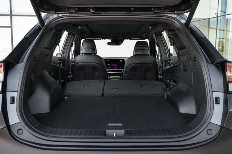 2024 Kia Sportage PHEV cargo space with second row seats folded.