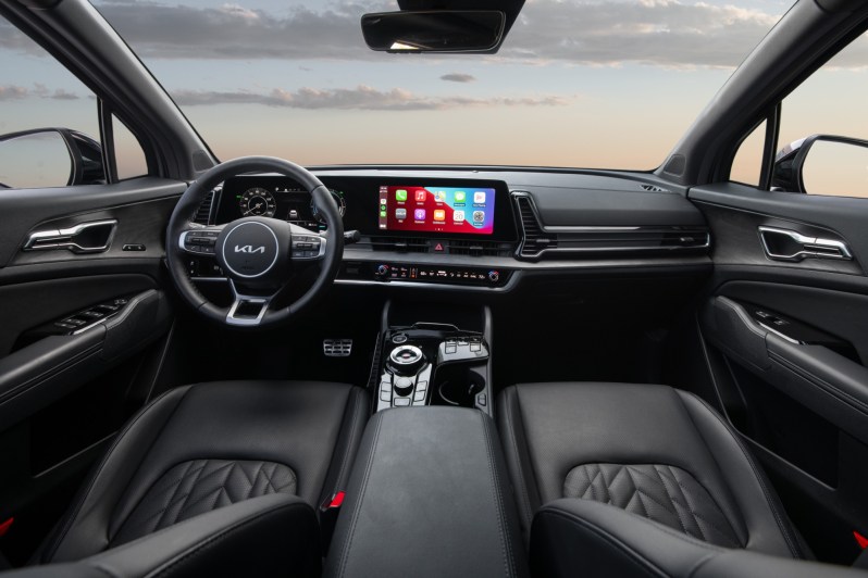 2024 Kia Sportage PHEV front seats and dashboard.