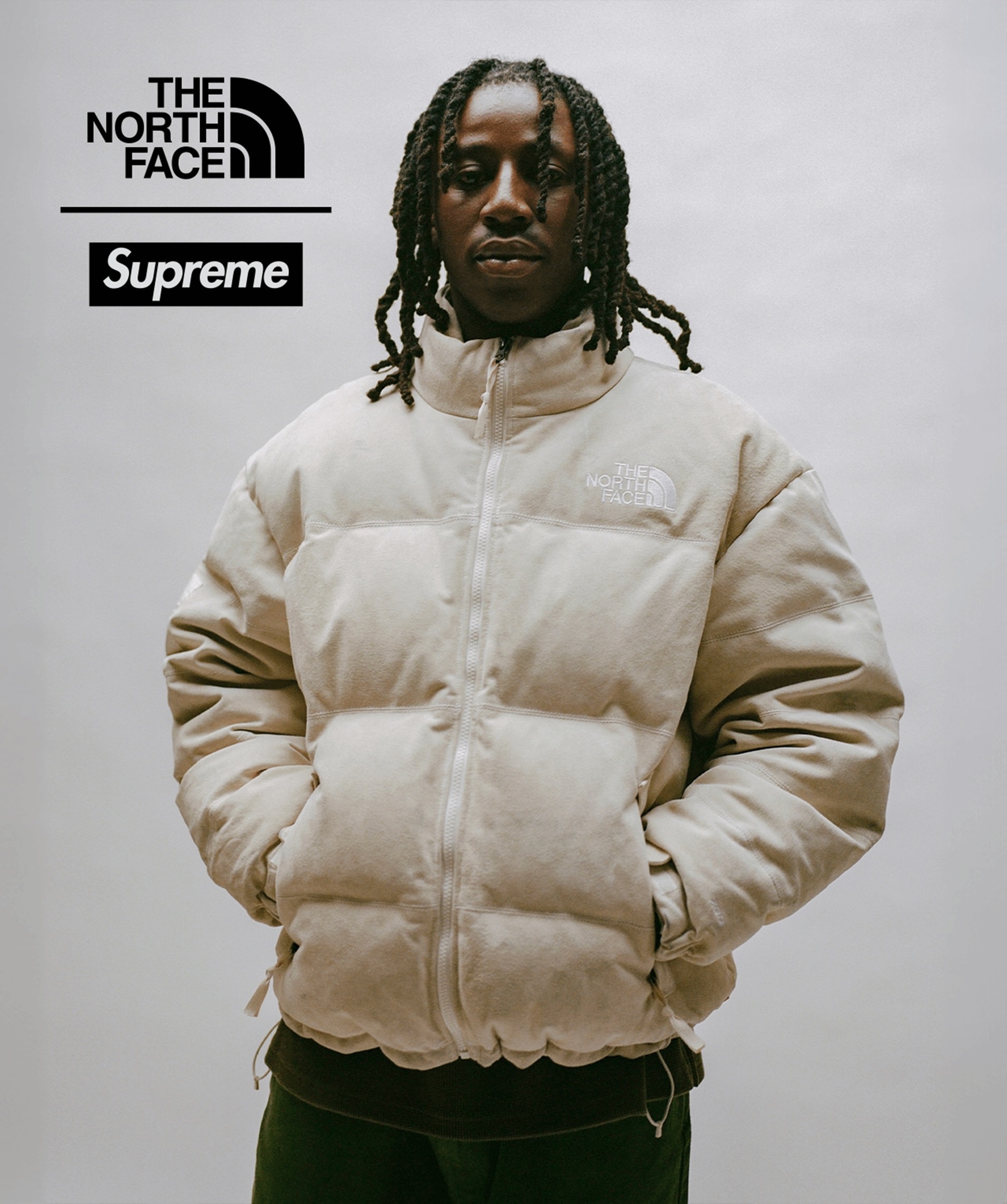 Supreme x The North Face white Nuptse jacket on model